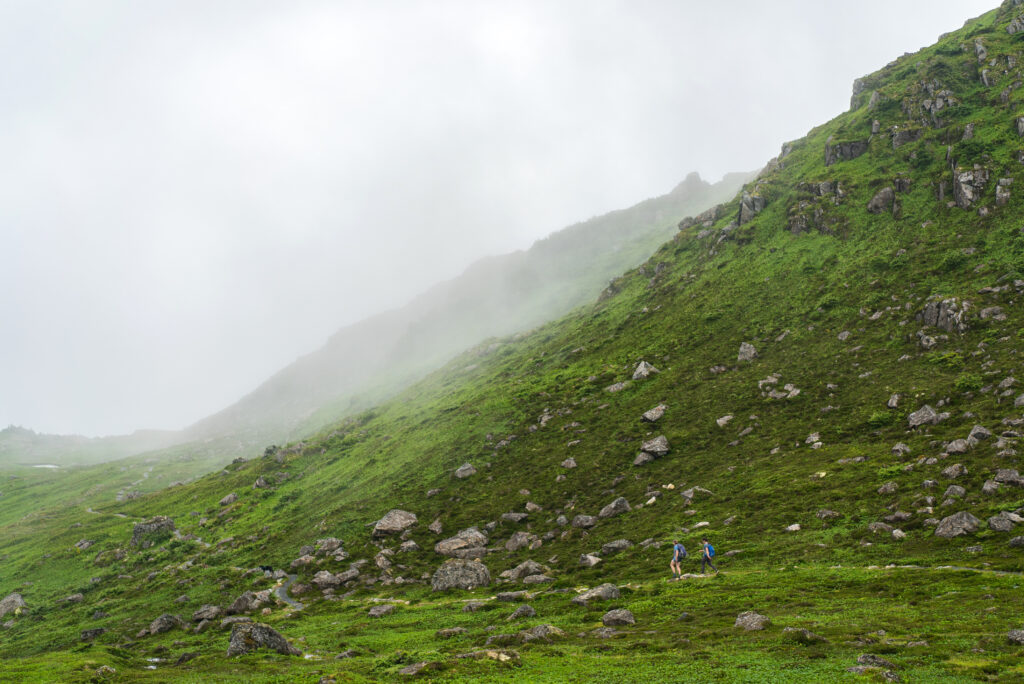 A zoomed-out view of hikers near the Gavan Hill summit.